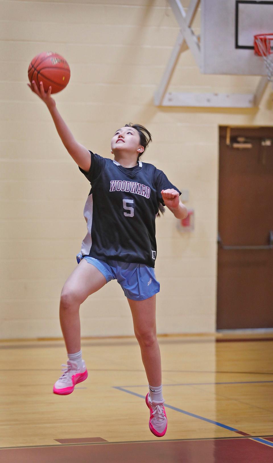 Woodward School sophomore Nicole Leung practices with the team at the Salvation Army gymnasium in Quincy on Monday, Jan. 8, 2024.