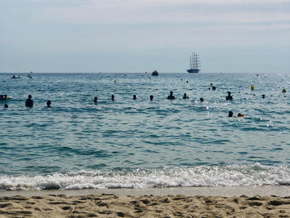 On the beach in the French Riviera.  Star Clippers cruise, Laura Kiniry, "I went on a tall sailing ship in the French Riviera for a week and felt transported to a bygone era."