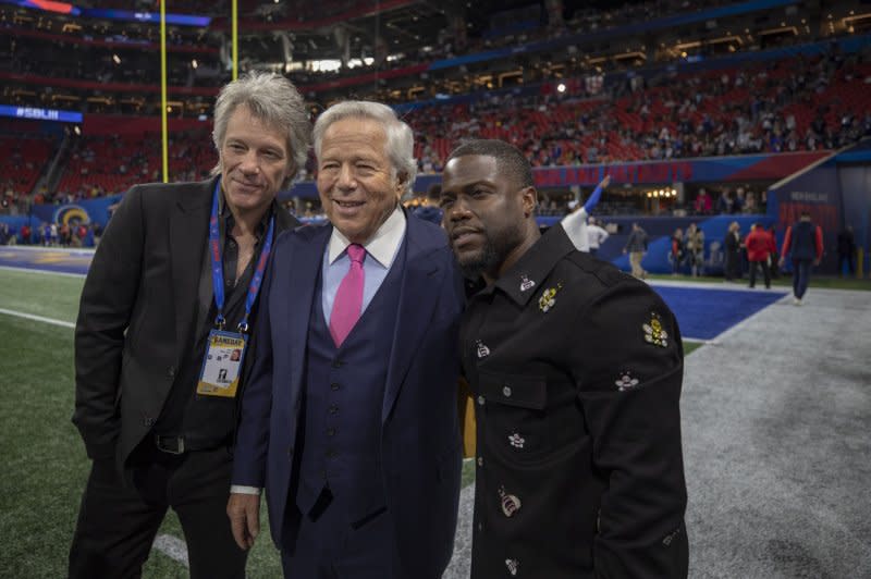 Jon Bon Jovi (L), New England Patriots Owner Robert Kraft, and Kevin Hart (R), watch pregame activities at Super Bowl LIII before the New England Patriots face the Los Angeles Rams at Mercedes-Benz Stadium in 2019 in Atlanta. File Photo by Tasos Katopodis/UPI