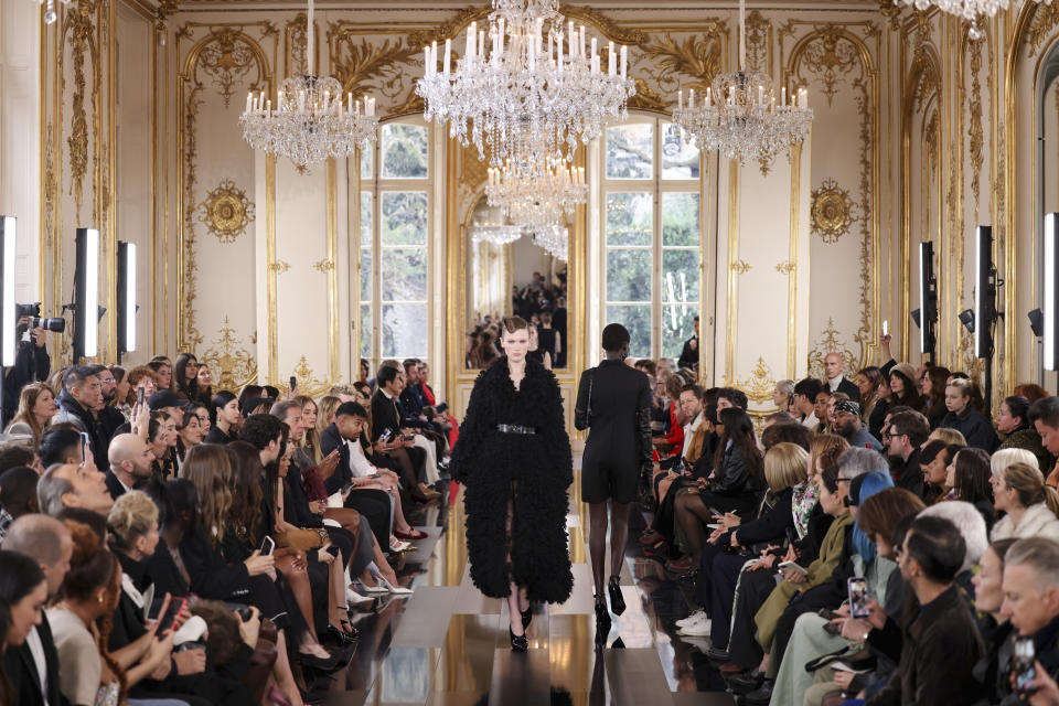 A model wears a creation as part of the Valentino Fall/Winter 2024-2025 ready-to-wear collection presented Sunday, March 3, 2024 in Paris. (Photo by Vianney Le Caer/Invision/AP)