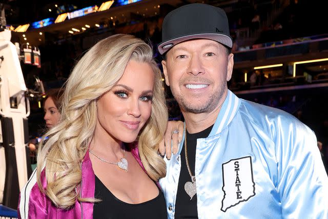 <p>Kevin Mazur/Getty </p> Jenny McCarthy and Donnie Wahlberg at a 2024 NBA All-Star Game