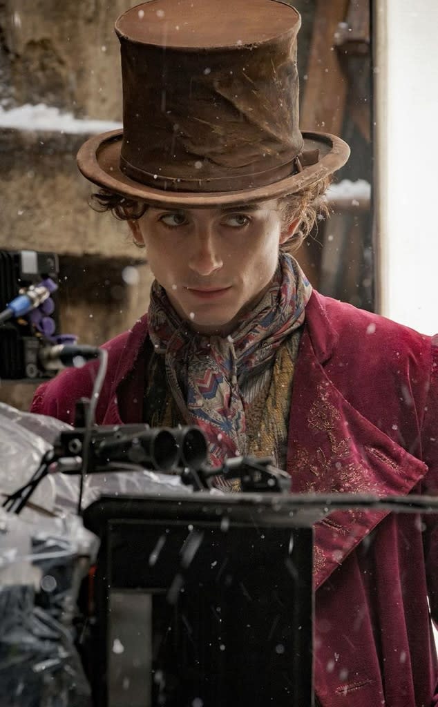 Timothy chalamet, angry, wonka, umpa lumpa, candy, intense, creepy, willy  wonka, top hat, yellow, pink, red, scary, dark, creep, weird on Craiyon