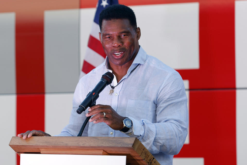 FILE - Herschel Walker, the Republican candidate for U.S. Senate in Georgia, speaks during a campaign stop in Smyrna, Ga., Thursday, Nov. 3, 2022. Walker and Sen. Raphael Warnock meet Tuesday, Nov. 8, in Georgia’s Senate contest that could help determine which party controls the Senate for the next two years. More than 2.5 million Georgia voters have already cast ballots, about a 20% increase over advanced voting in 2018. (AP Photo/Todd Kirkland, File)