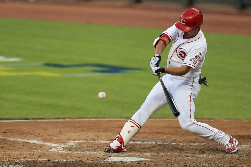 Cincinnati Reds' Shogo Akiyama hits an RBI-single in the sixth inning during a baseball game against the Detroit Tigers at Great American Ballpark in Cincinnati, Friday, July 24, 2020. (AP Photo/Aaron Doster)