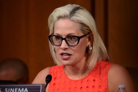 Sinema speaks during Facebook digital currency hearing