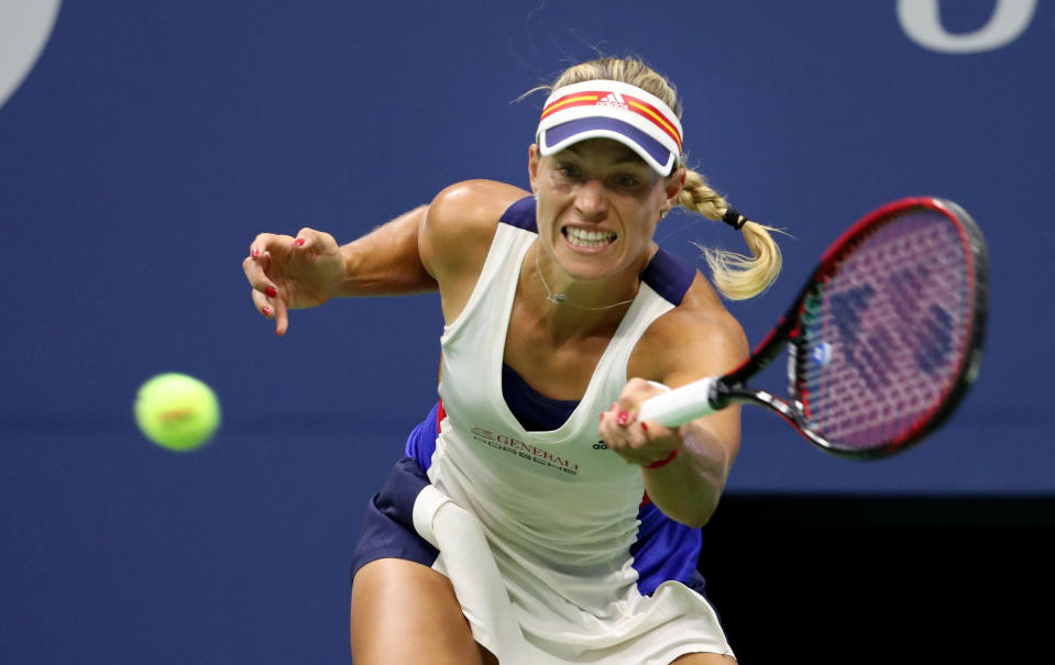 <p>Angelique Kerber of Germany returns a shot to Naomi Osaka of Japan on Day Two of the 2017 US Open at the USTA Billie Jean King National Tennis Center on August 29, 2017 in the Flushing neighborhood of the Queens borough of New York City. (Photo by Abbie Parr/Getty Images) </p>