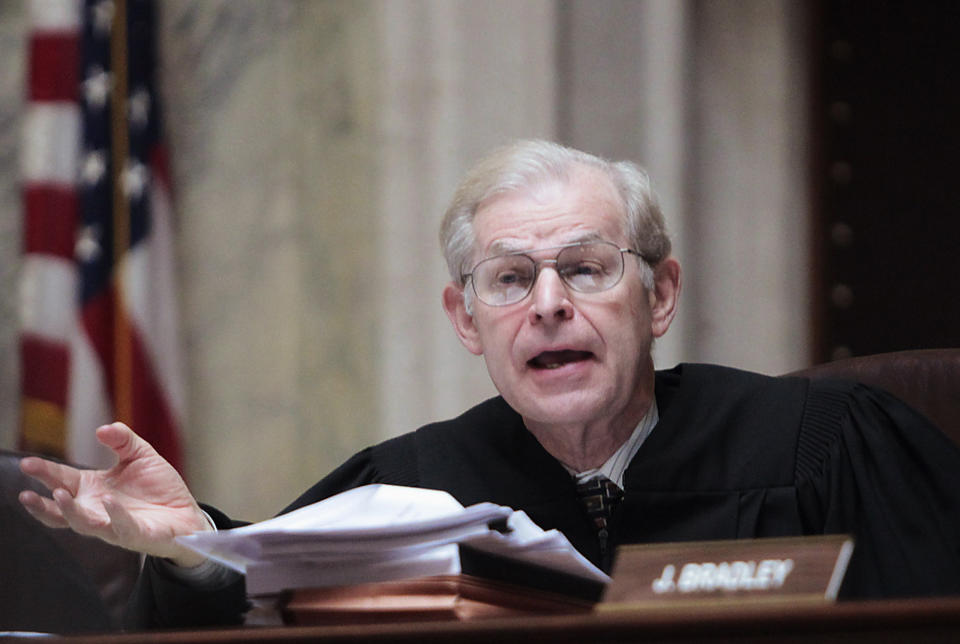 FILE - Wisconsin Supreme Court Justice David Prosser posing a question during a hearing at the state Capitol in Madison, Wis., June 6, 2011. Former Justice Prosser, tapped to investigate impeaching newly elected Justice Janet Protasiewicz for taking Democratic Party money, accepted donations from the state Republican Party when he was on the court. (John Hart/Wisconsin State Journal via AP, Pool, File)