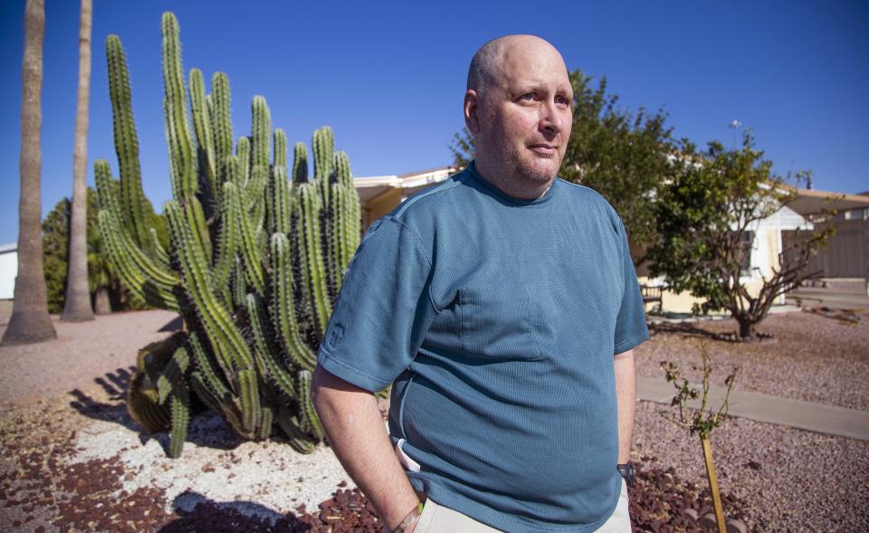 Jim Boerner, a U.S. Air Force veteran, may lose his Mesa home over $236 in unpaid taxes he thought had been paid. He poses outside his home July 8, 2019.