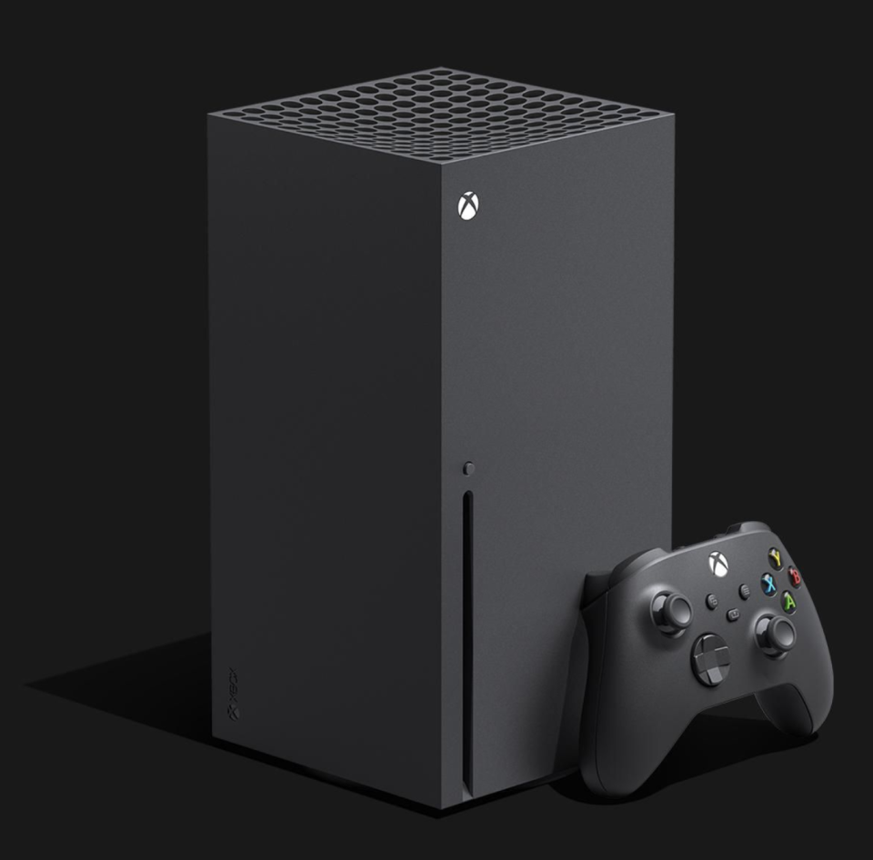 Xbox Series X black box on black background with black controller (Photo via Walmart)