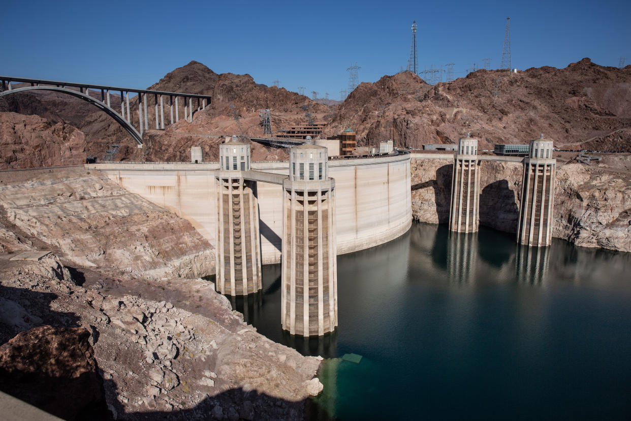 The Hoover Dam water intake towers at Lake Mead, with low levels of water.