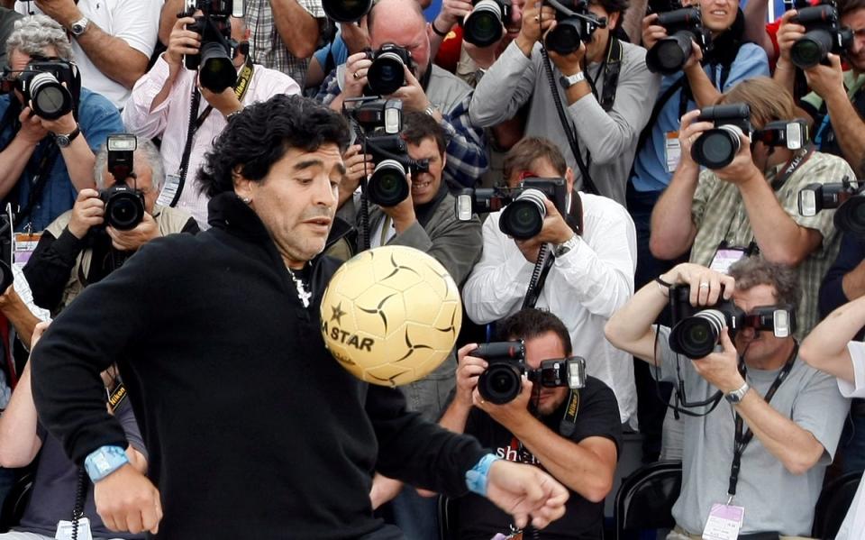 Diego Maradona plays with a ball while promoting the film ‘Maradona by Kusturica’ at the 61st Cannes on 20 May 2008 (Reuters)