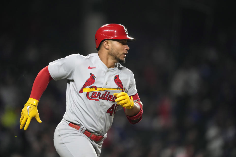 St. Louis Cardinals' Willson Contreras rounds first on his RBI double off Chicago Cubs starting pitcher Marcus Stroman during the sixth inning of a baseball game on Monday, May 8, 2023, in Chicago. (AP Photo/Charles Rex Arbogast)