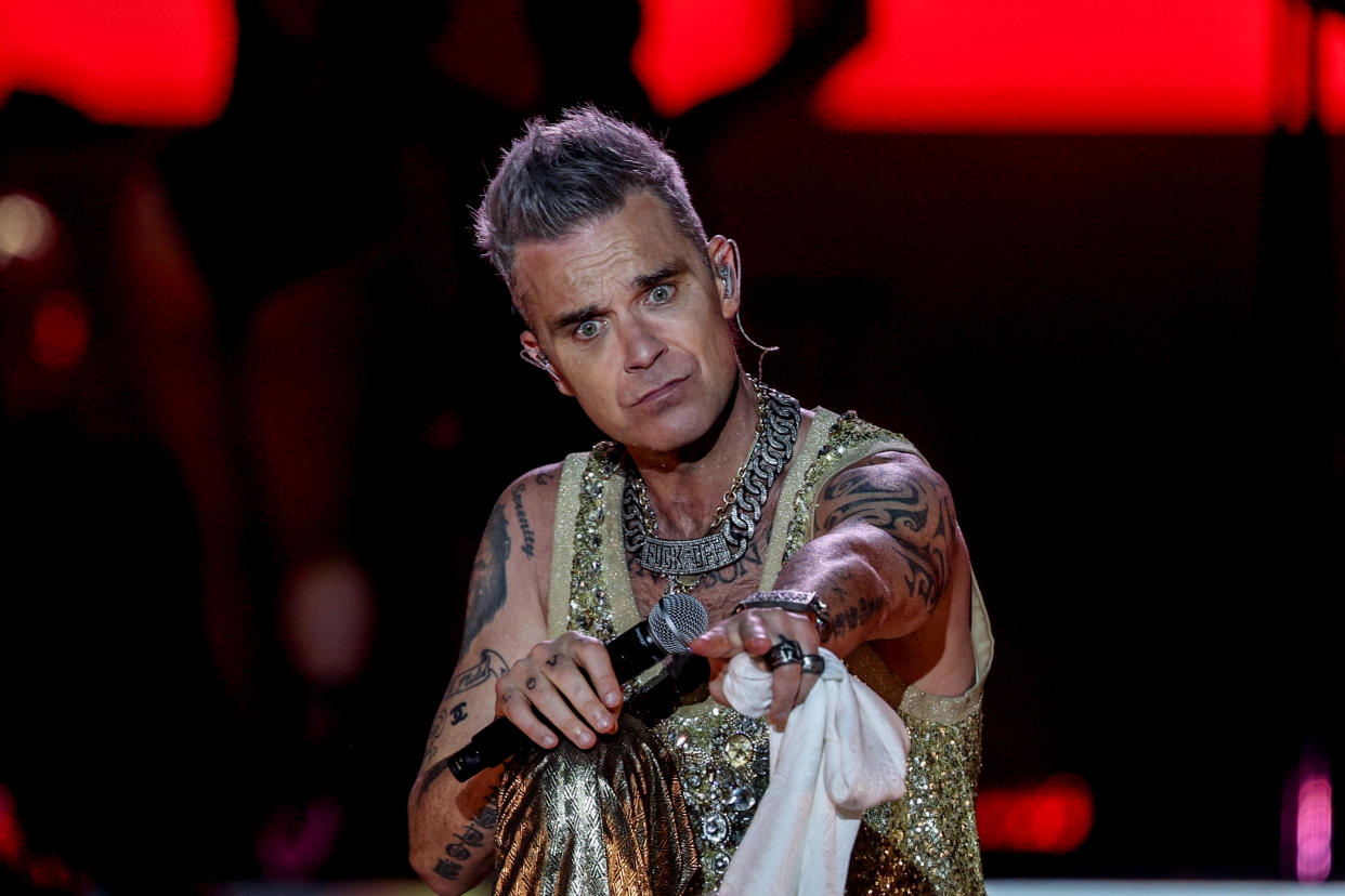 Robbie Williams during a performance on the first day of the Mad Cool 2023 festival, on July 6, 2023, in Villaverde, Madrid, Spain. Robert Peter Williams, better known as Robbie Williams, is a British pop rock singer, songwriter and actor. He began his musical career in the group Take That. Mad Cool 2023 is the most important music festival in Madrid and one of the most important nationally. This year Mad Cool premieres new location and enclosure: 185,000 square meters that are located in Villaverde and has eight stages. Since its birth in 2016, Mad Cool has climbed steps to become one of the Spanish festival events with the most ambitious lineup. (Photo By Ricardo Rubio/Europa Press via Getty Images)