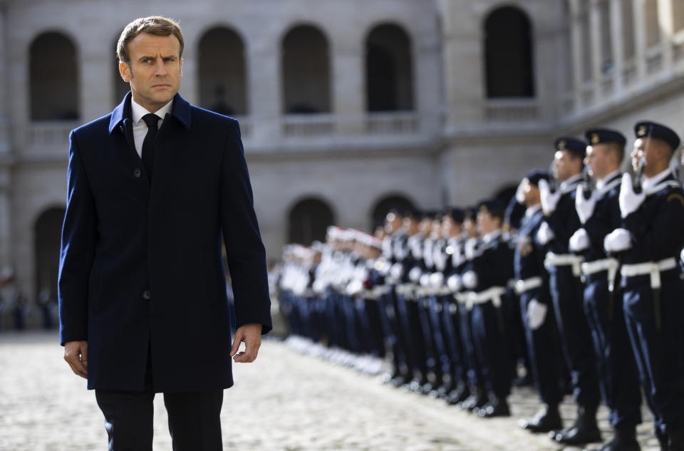 French President Emmanuel Macron reviews the troops during a military ceremony at the Invalides monument in Paris, Thursday, Nov.4, 2021 (Ian Langsdon, Pool Photo via AP)