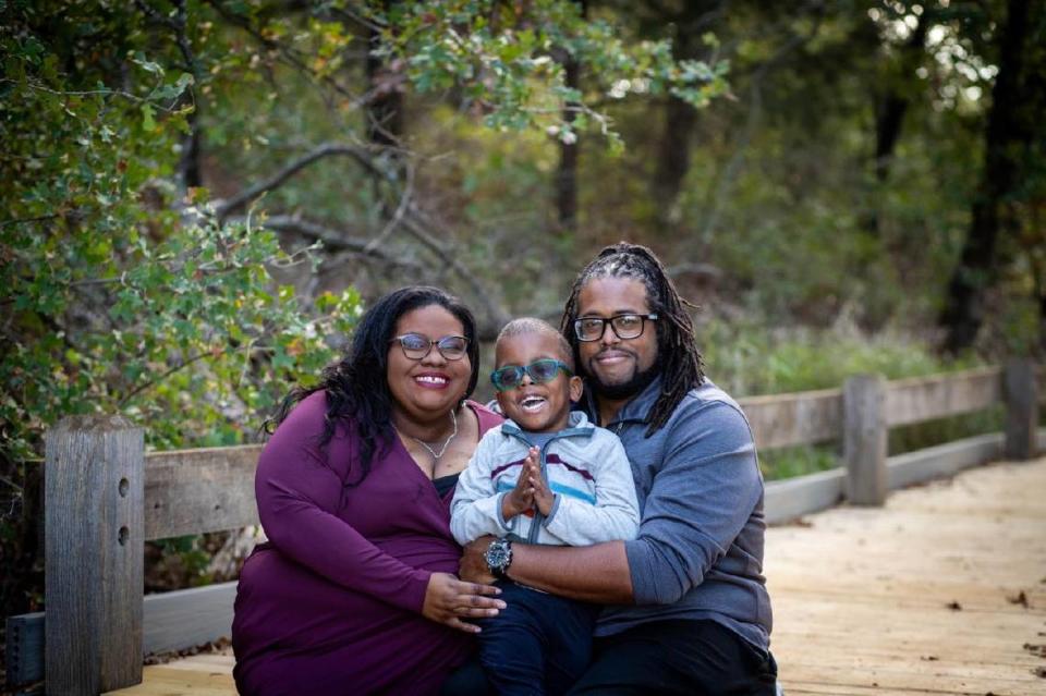 Natalie Dorsey and Bryan Dorsey II pose with their son Bryan Dorsey III.