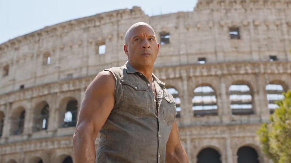 vin diesel as dom toretto stands in front of the roman colosseum in a scene from fast x