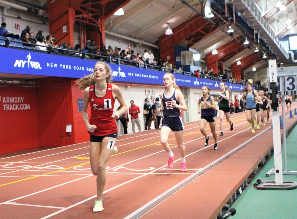 Ketcham's Abigail Kowalczyk leads Ava Pennachio of Eastchester, Sloan Wasserman of John Jay-Cross River and the rest of the field during the girls 3,000 at the Section 1 State Indoor Track and Field Qualifier Feb. 19, 2023.