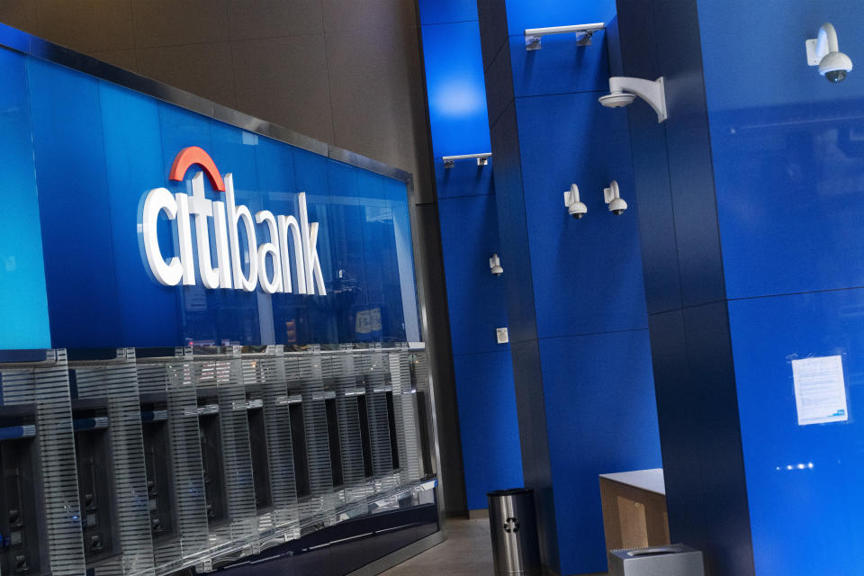 A Citibank office is open, Wednesday, Jan. 13, 2021 in New York. The nation’s largest banks are expected to report big profits for the first quarter, Tuesday, April 13, amid renewed confidence that pandemic-battered consumers and businesses can repay their debts and start borrowing again (AP Photo/Mark Lennihan)