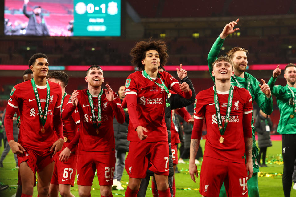 Liverpool players (from left) Jarell Quansah, Andrew Robertson, Jayden Danns, Bobby Clark and Caoimhin Kelleher celebrate winning the Carabao Cup. 