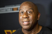 Washington Commanders part-owner Magic Johnson speaks with reporters after an event at the Boys & Girls Club of Greater Washington, Thursday, Sept. 7, 2023, in Washington. (AP Photo/Alex Brandon)