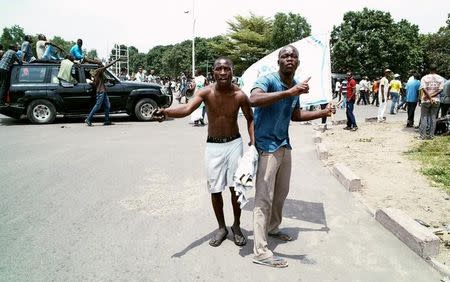 Congolese opposition activists react during a march to press President Joseph Kabila to step down in the Democratic Republic of Congo's capital Kinshasa, September 19, 2016. REUTERS/Stringer