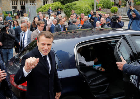 French President Emmanuel Macron leaves after casting his ballot during the European Parliament Elections, in Le Touquet, France, May 26, 2019. REUTERS/Philippe Wojazer