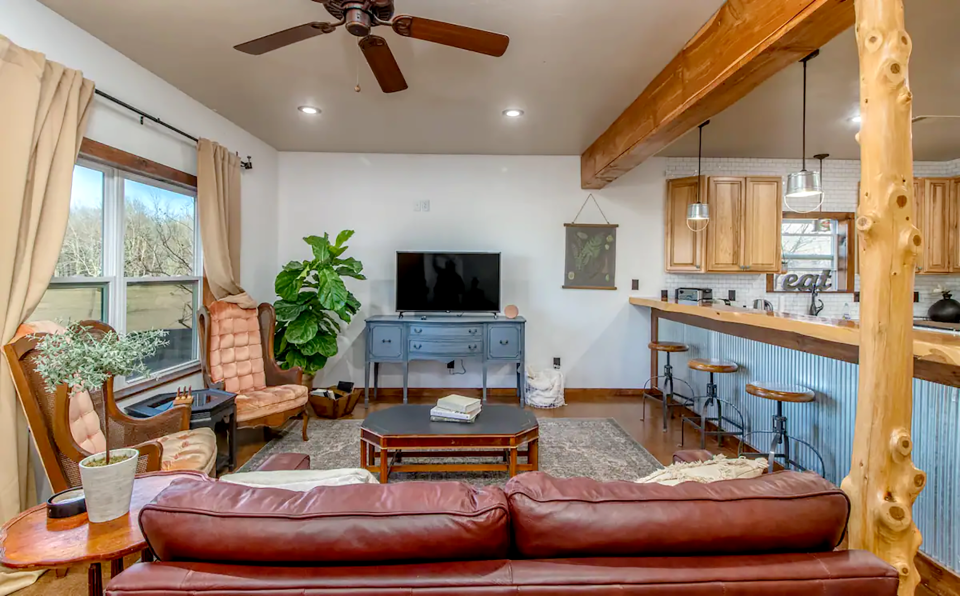 The living/relaxing area welcomes guests at James and Erika Felder's rustic home-away-from-home outside Calera, near Durant, which was Oklahoma's No. 1 top New Airbnb Host in 2022.