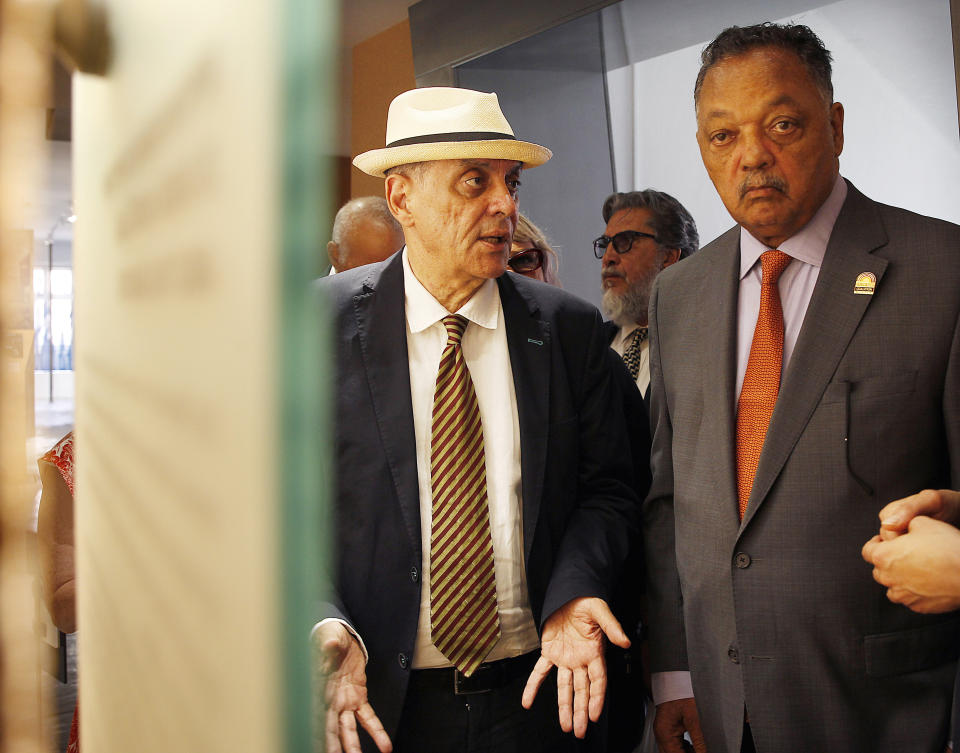 Rev. Jesse Jackson, right, and the head of Germany's Central Council of Sinti and Roma, Romani Rose visit the former Nazi death camp of Auschwitz-Birkenau in Oswiecim, Poland on Friday, Aug. 2, 2019. Rev. Jesse Jackson gathered Friday with survivors at the former Nazi death camp of Auschwitz-Birkenau to commemorate an often forgotten genocide — that of the Roma people. In addition to the 6 million Jews killed in camps such as Auschwitz, the Nazis killed other minorities during World War II, including between 250,000 and 500,000 Roma and Sinti. (AP Photo/Czarek Sokolowski)