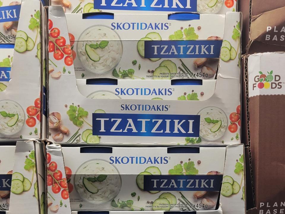 Stack of boxes with &quot;Tzatziki&quot; text on them