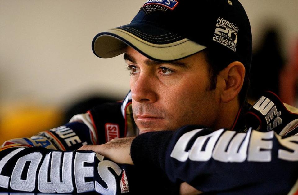 2/14/04 Driver Jimmie Johnson relaxes in the garage at Daytona International Speedway prior to practice Saturday morning. JEFF SINER/STAFF