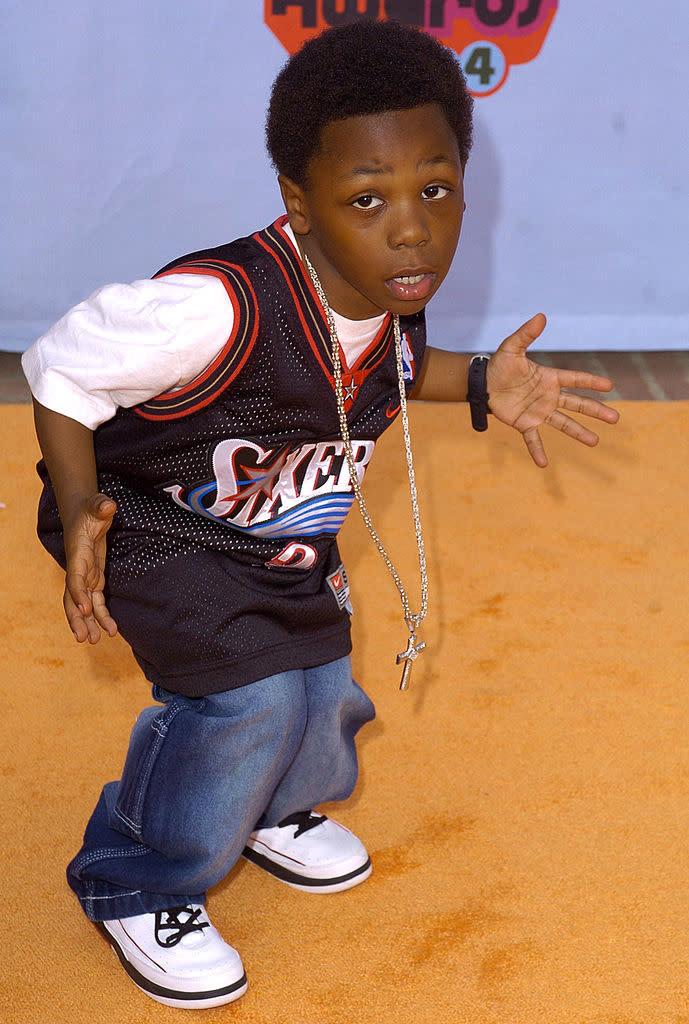 him posing in a basketball jersey