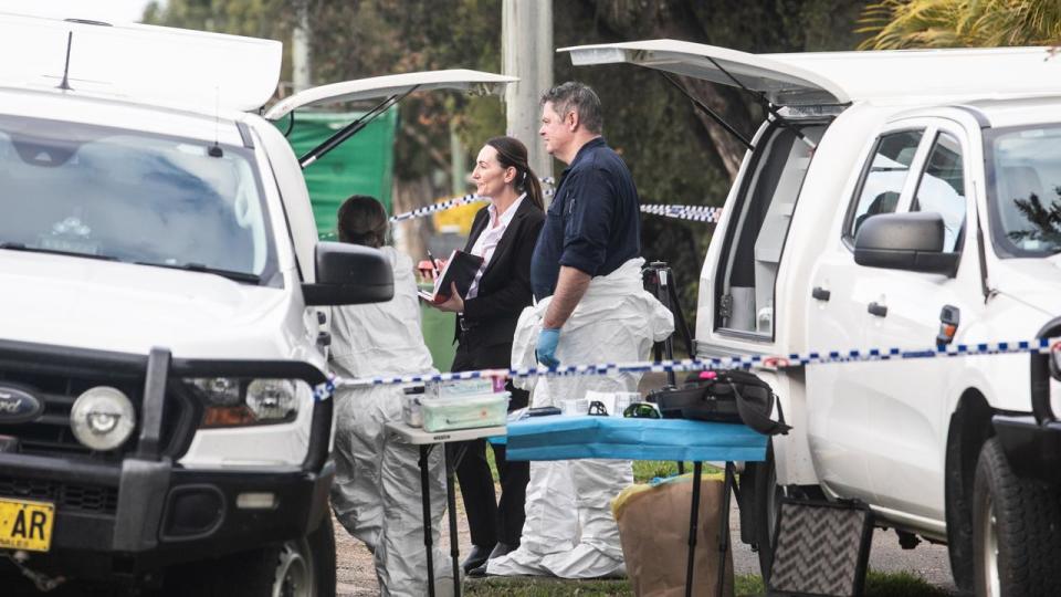 Police examine the crime scene in Casino, NSW. Picture: Newswire/Natalie Grono