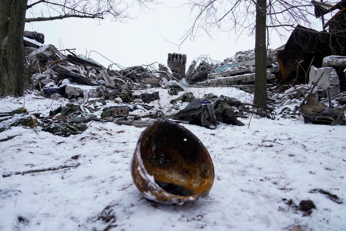 Debris of a vocational school which was used as a temporary deployment centre for Russian soldiers after it was hit by a Ukrainian strike (AFP/Getty)