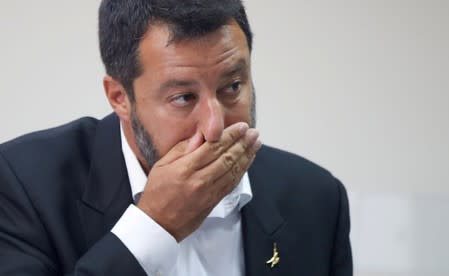 FILE PHOTO: Italian Deputy PM Matteo Salvini reacts as he holds a news conference in southern Italy on a bank holiday as the government crisis continues, in Castel Volturno