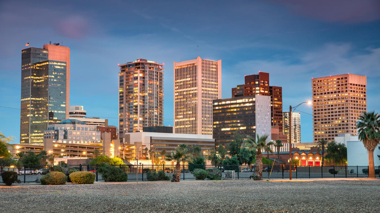 Cityscape skyline view of office buildings and apartment condominiums in downtown Phoenix Arizona USA.