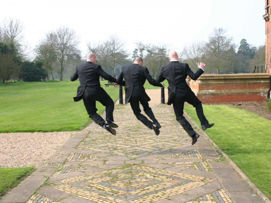 groomsmen jumping