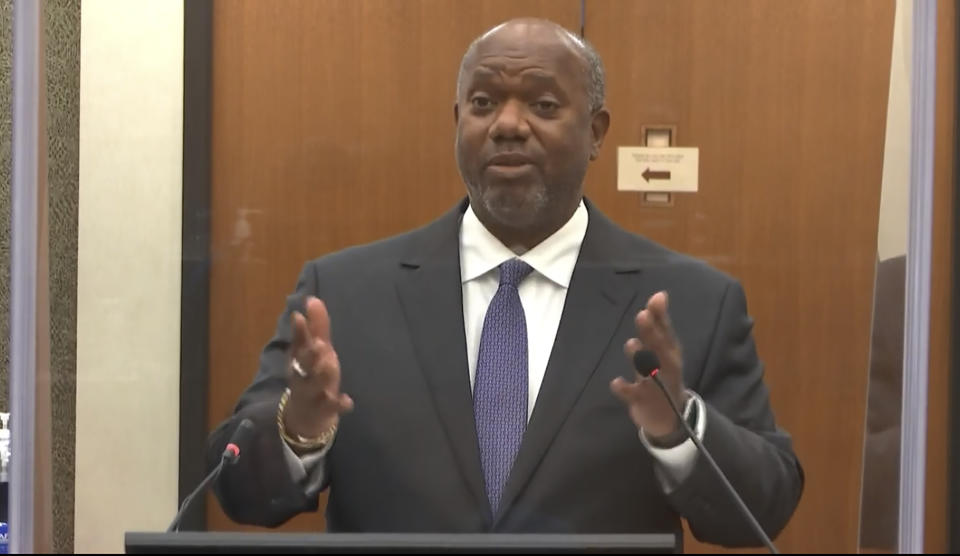 In this image from video, prosecutor Jerry Blackwell questions Dr. David Fowler, a retired forensic pathologist and former chief medical examiner for the state of Maryland, as Hennepin County Judge Peter Cahill presides, Wednesday, April 14, 2021, in the trial of former Minneapolis police Officer Derek Chauvin at the Hennepin County Courthouse in Minneapolis, Minn. Chauvin is charged in the May 25, 2020 death of George Floyd. (Court TV via AP, Pool)