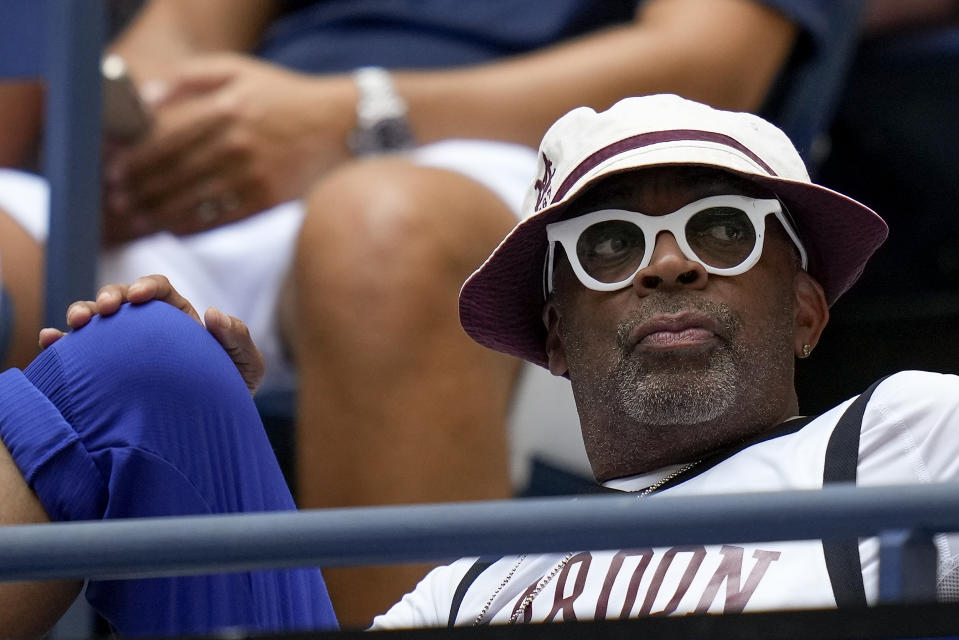 Spike Lee watches play between Novak Djokovic, of Serbia, and Taylor Fritz, of the United States, during the quarterfinals of the U.S. Open tennis championships, Tuesday, Sept. 5, 2023, in New York. (AP Photo/Seth Wenig)