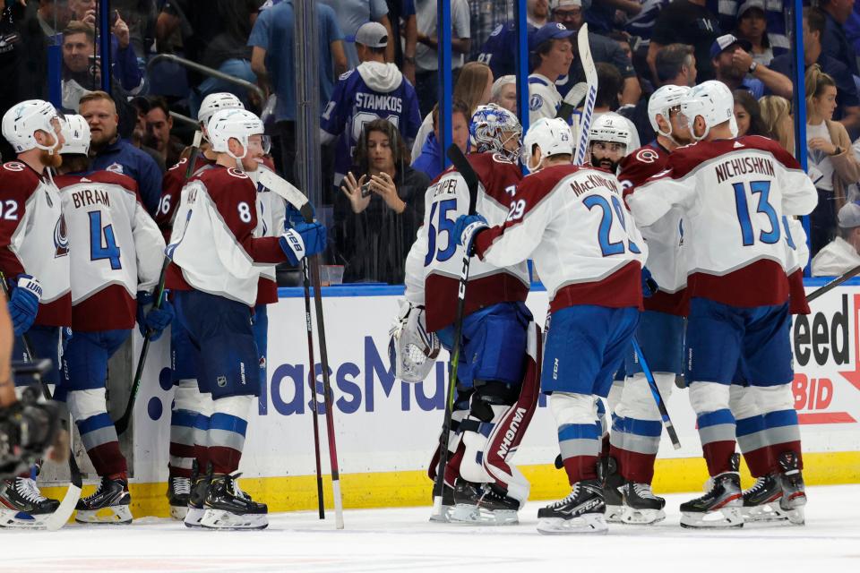 Game 4: Colorado Avalanche players celebrate their 3-2 overtime win against the Tampa Bay Lightning. They lead the two-time defending champions three games to one.