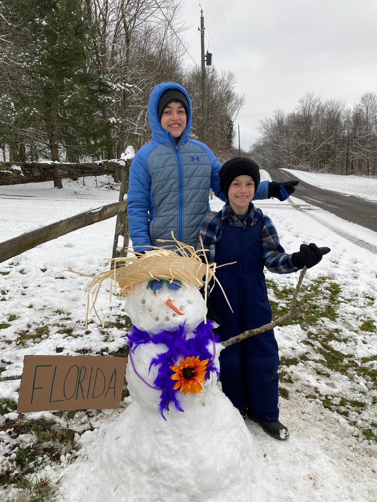 Brothers Nicholas, 12, and Andrew Cleveland, 9, built a snowman who's interested in warmer weather. The snowman, located outside their home along Mount Pleasant Road in Dover, is hitchhiking to Florida.