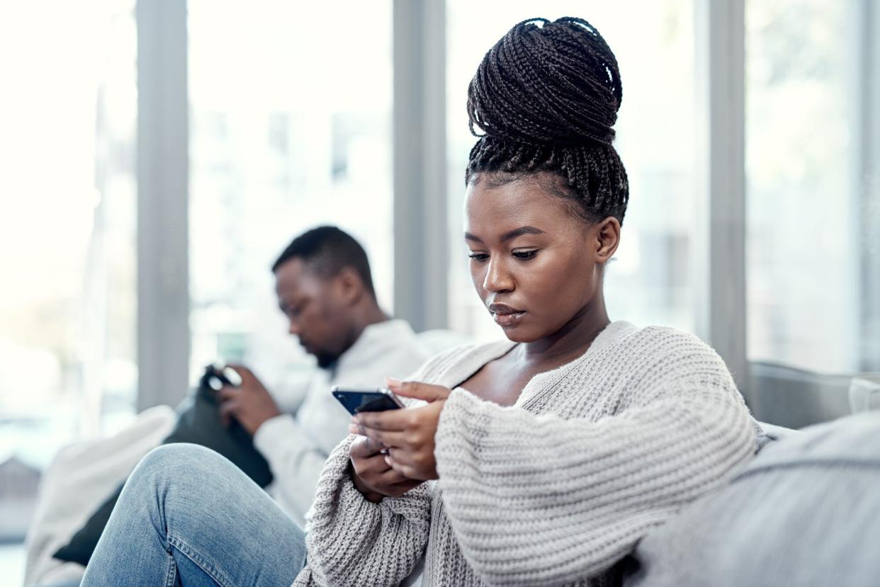 couple on their phones