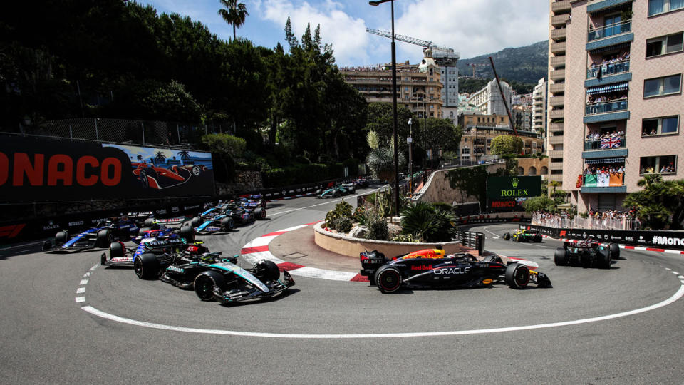 The procession of racers navigate the Fairmont Hairpin during Formula 1's 2024 Monaco Grand Prix.