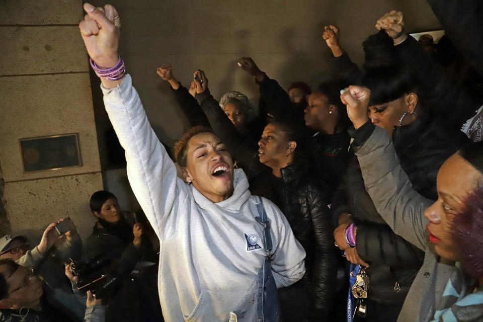 Supporters of Antwon Rose II, stand on the steps of Allegheny County Courthouse after hearing the verdict of not guilty on all charges for Michael Rosfeld, a former police officer in East Pittsburgh, Pa., Friday, March 22, 2019. Rosfeld was charged with homicide in the fatal shooting of Antwon Rose II as he fled during a traffic stop on June 19, 2018. (AP Photo/Gene J. Puskar)