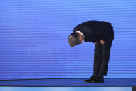 Gyeonggi Gov. Lee Jae-myung, left, elected as the ruling Democratic Party's candidate for next year's presidential election, bows after winning the party's final race in Seoul, South Korea, Sunday, Oct. 10, 2021. (Kim Hong-ji/Pool Photo via AP)