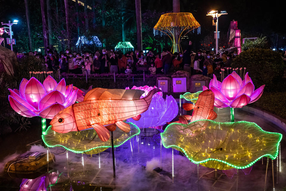 People enjoy decorations during the Lantern Festival in Guangzhou, China, on Feb. 5, 2023.