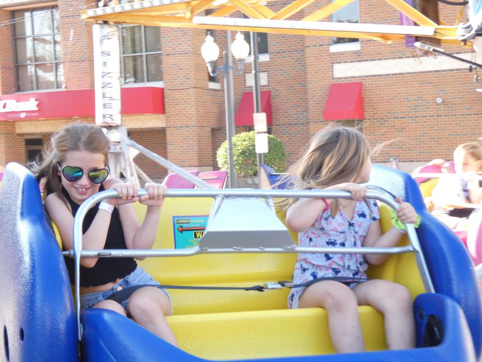 Children enjoy a ride Thursday at the 2022 Bucyrus Bratwurst Festival.