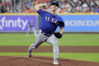 Texas Rangers starting pitcher Glenn Otto throws to a Houston Astros batter during the first inning of a baseball game Thursday, May 19, 2022, in Houston. (AP Photo/Michael Wyke)