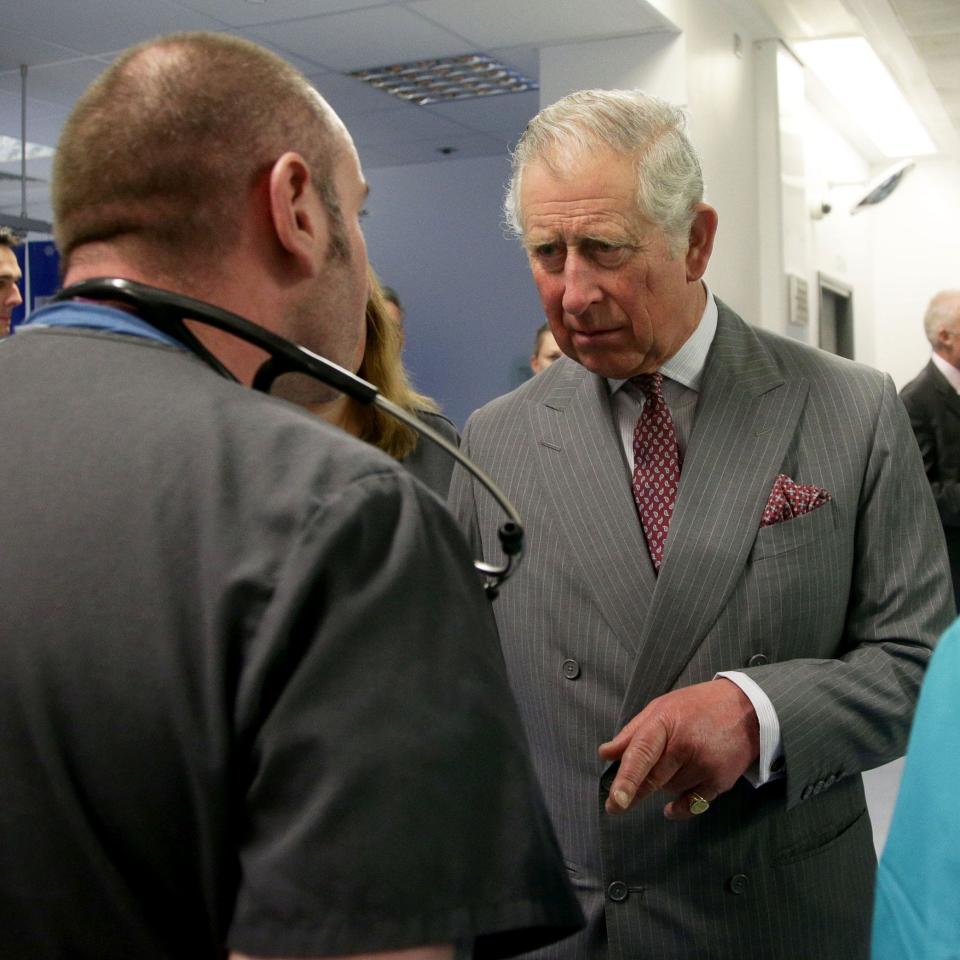 The Prince of Wales in discussion with a hospital medic - Credit: Yui Mok/PA