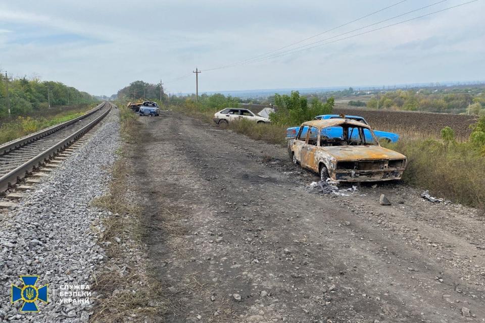 Cars from a civilian convoy, which Ukrainian State Security Service say was hit by a shelling of Russian troops (Reuters)