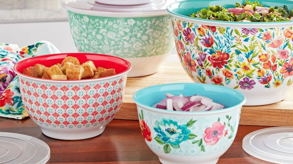 a group of bowls with colorful designs